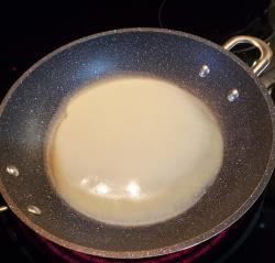 Blintzes batter in the pan (Joan Ross photo)