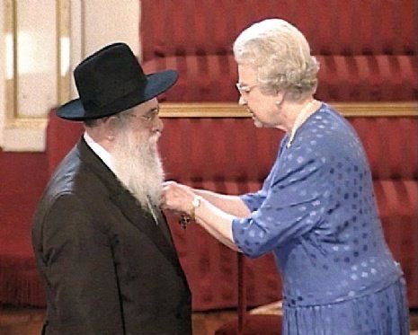 Queen Elizabeth II awarding my Grandfather